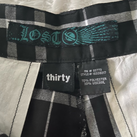 …Lost: black & white checkered shorts. Size (30). - Picture 7 of 7